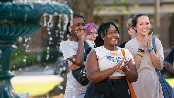 Students cheering in a crowd